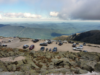 Looking out over the parking area and nearby peaks.