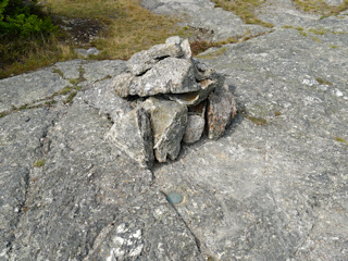 Eyelevel view of the disk at the base of the cairn.