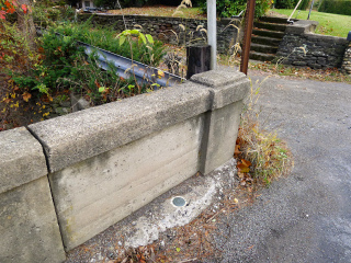 Eyelevel view of the disk on the bridge parapet.