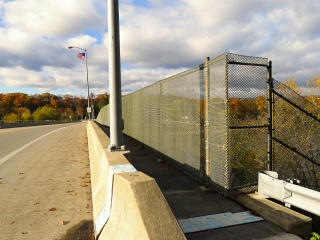 Eyelevel view of the disk set into the wall of the bridge.