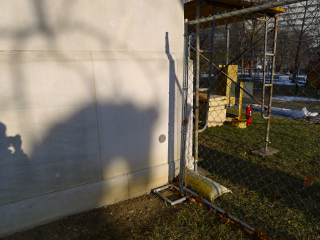 Eyelevel view of the disk near the corner of the building.