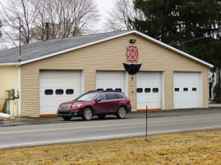 The fire house is still directly across Route 79 from the mark.