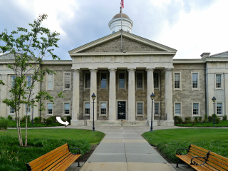 Looking W toward the courthouse; mark location indicated on SE corner of porch.