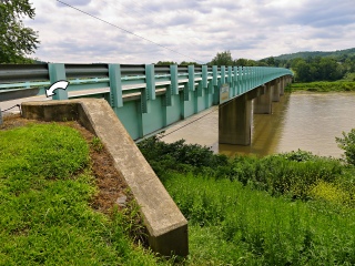 Looking S from the small park toward the mark on the Church Street Bridge