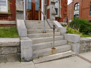 Eyelevel view of the disk on the granite steps.