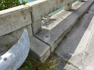 Eyelevel view of the disk on the bridge curb