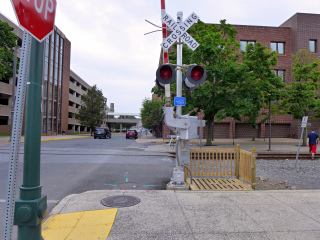 Looking W along Cherry St. from the railroad crossing signal.