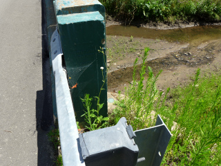 Eyelevel view of the disk on the bridge wingwall