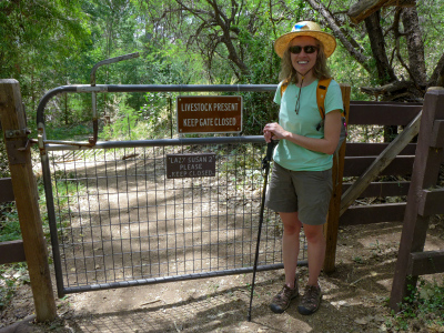 Zhanna at a gate along the Anza Trail