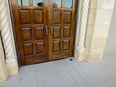 NGS benchmark disk L 469, set in the doorway of the old Curley School in Ajo