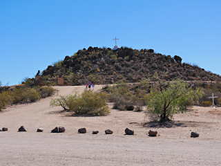 The cross atop Grotto Hill, and another small cross at the base of the hill