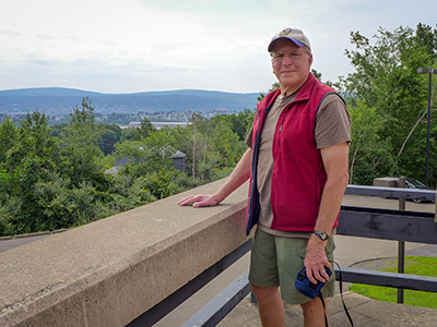 Rich checks out the overlook after finding the cache.