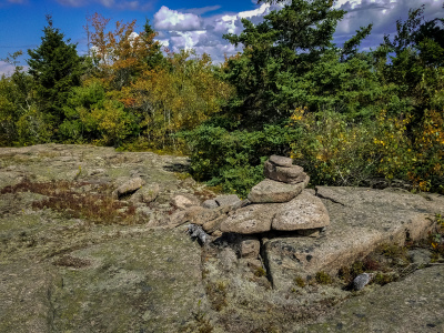 A large cairn marks the second summit