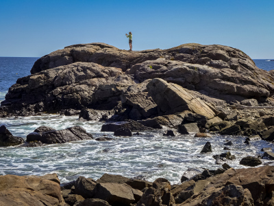 Zhanna investigates this outcrop, looking for benchmarks.