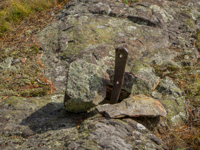 One of two pins set into the ledge