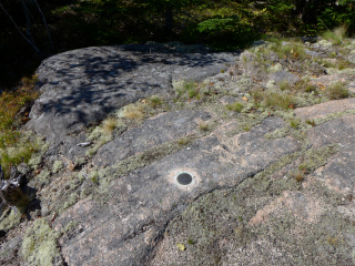 Eyelevel view of the disk in exposed bedrock.