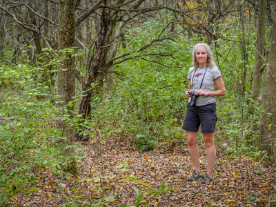 Zhanna heads into the woods on the trail