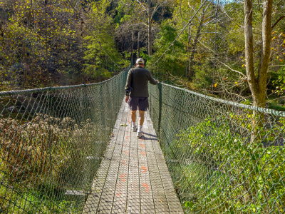 Rich walks across the bridge.