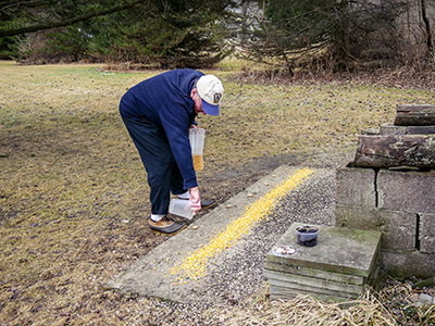 Rich spreads out a few treats for the local critters