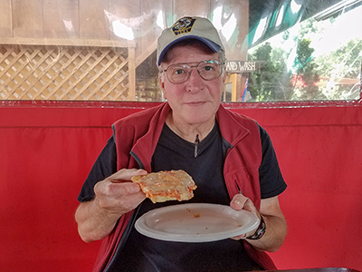 Rich enjoys his pizza. We haven't had it in a while!