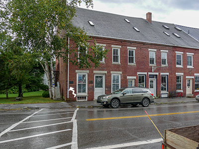 Looking S across East Main Street (mark indicated)