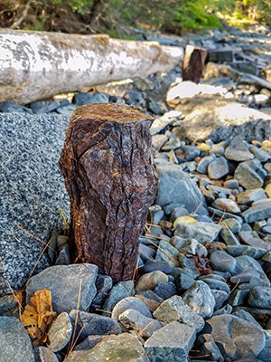 Heavy iron pins, now rusting away, once anchored wide granite steps.