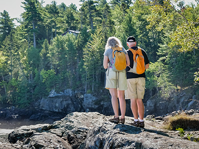 Zhanna and dad (Dave) investigate the rocky shore at “Thrumcap Beach” off of Schooner Head Road