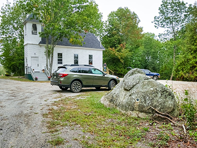 The benchmark is set in this large boulder near the Tremont Baptist Church