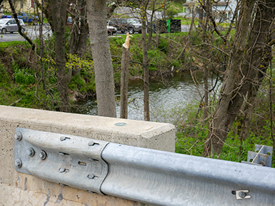 Eyelevel view of the disk on the wall at the southeast corner of the bridge