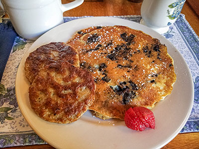 Blueberry pancakes with sausage patties