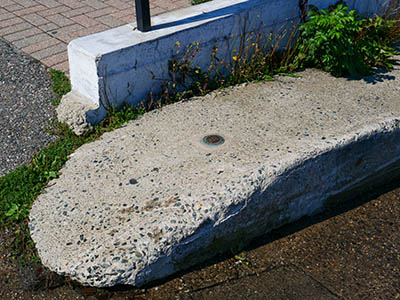 Eyelevel view of the disk set in the end of the boat ramp berm