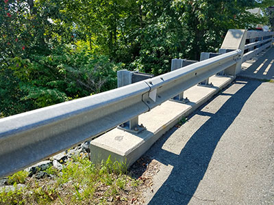 Eyelevel view of the disk on the bridge curb