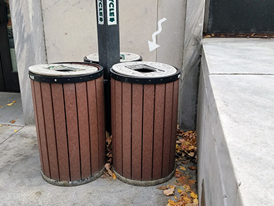 The disk is beneath these recycling bins