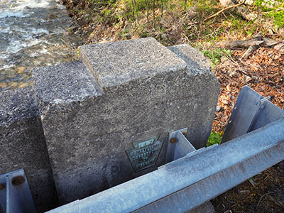 PDH bridge plaque showing date of bridge (1957)