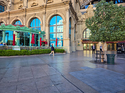 The disk is set in the sidewalk in front of the French bistro Mon Ami Gabi and the “Eiffel Tower”