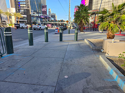 Eyelevel view of the disk in the sidewalk; looking N along Las Vegas Boulevard