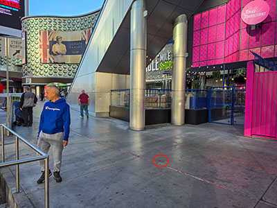 The disk is near an escalator at the Miracle Mile Shops plaza