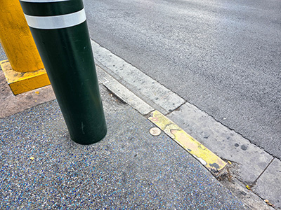 Eyelevel view of the disk at the outer edge of the sidewalk