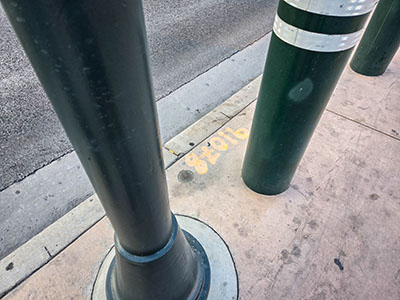 Eyelevel view of the disk at the outer edge of the sidewalk