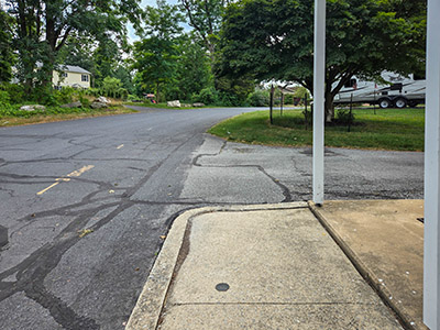 Eyelevel view of the disk on the sidewalk