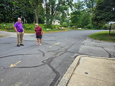 Looking SW toward the station location. My father is talking with the friendly neighbor.