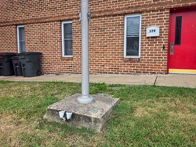 Eyelevel view of the disk on the flagpole base