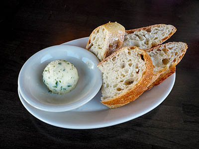 Delicious French bread with chive butter
