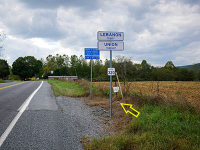 View SW, showing county line sign, mark location indicated