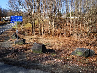 Could it still be here, near these boulders (and beneath a lot of vegetation)?