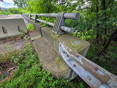 Eyelevel view of the disk on the bridge parapet wall