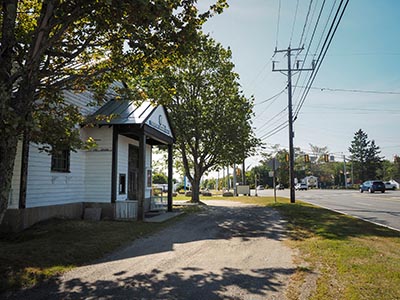 View SSW toward the intersection of ME Route 3 and ME Route 230.