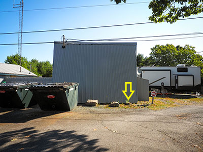 Looking E toward the well house, mark location indicated