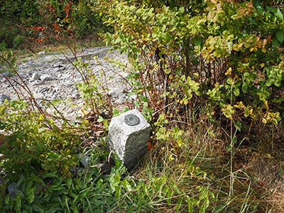 Eyelevel view of the disk on the granite post