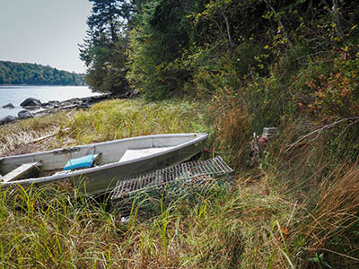 A boat is tied up to the post.